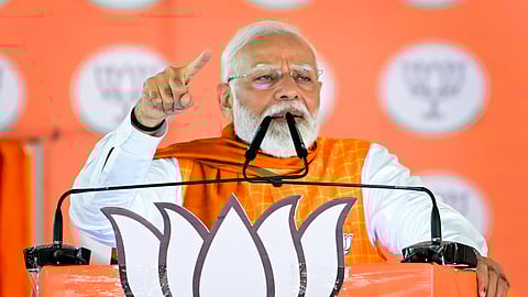 Prime Minister Narendra Modi addresses a public meeting for Lok Sabha polls in Khargone.