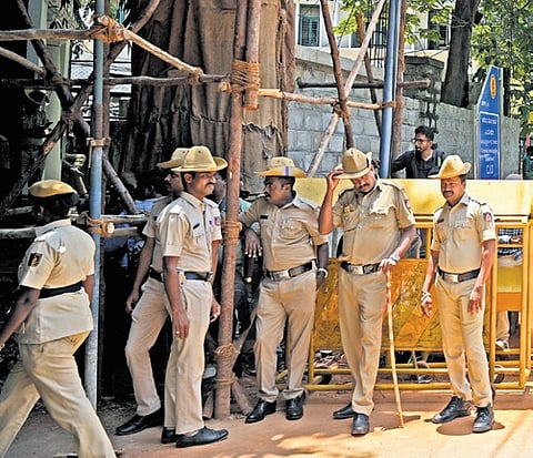 Police deployed outside the SIT office in Bengaluru on Friday