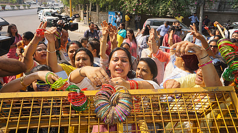 BJP's women workers protest outside Delhi Chief Minister Arvind Kejriwal's official residence on Friday.