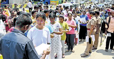 Students appearing for NEET at Maduravoyal, Chennai, on Sunday