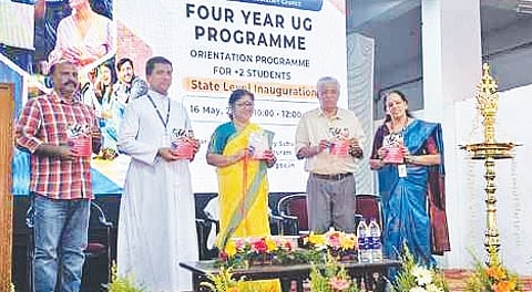 Higher Education Minister R Bindu releases a handbook on the Four-Year UG Programme during an orientation class for Plus Two students at St Mary’s HSS at Pattom