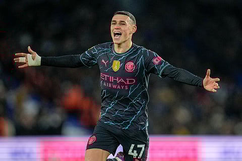 Manchester City's Phil Foden celebrates after scoring his side's second goal during the English Premier League soccer match between Brighton and Manchester City at the Falmer Stadium in Brighton, England, Thursday, April 25, 2024.