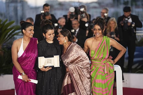 Payal Kapadia, second from left, winner of the grand prize for ‘All We Imagine as Light,’ poses with Divya Prabha, Chhaya Kadam and Kani Kusruti after the Cannes awards ceremony.
