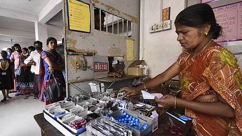 Coimbatore Medical College Hospital (CMCH) staff providing medicines to the patients in Coimbatore on Tuesday.