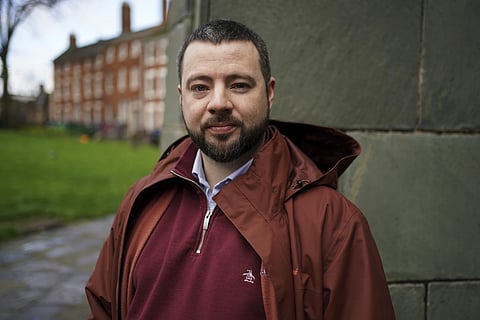Jason Evans, founder of the factor 8 infected blood campaign group, poses for a photo after an interview with the PA news agency in Coventry, England, Friday March 15, 2024.