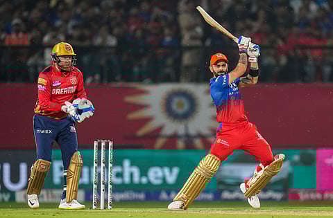 Royal Challengers Bengaluru's Virat Kohli plays a shot during an IPL match against Punjab Kings (Photo | PTI)