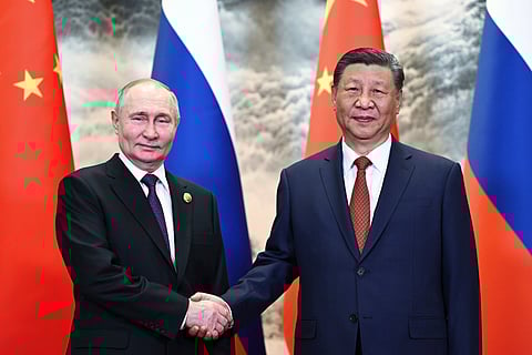 Chinese President Xi Jinping, right, and Russian President Vladimir Putin pose for a photo prior to their talks in Beijing, China, on Thursday, May 16, 2024.