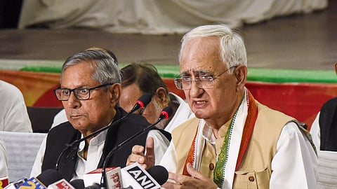 Congress leader Salman Khurshid with AICC state Incharge Mohan Prakash and others during a press conference at the party office, in Patna.