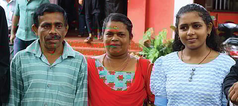 Subrahmanian and Krishnakumari along with their daughter Ahalya in front of the Alappuzha Family Court
