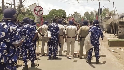Security personnel during a protest at Nandigram, in Purba Medinipur district, Thursday, May 23, 2024.