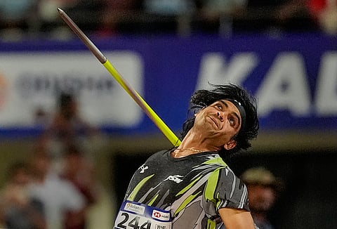 Neeraj Chopra of Haryana makes a throw during the men's javelin throw event at the 27th National Federation Senior Athletics Competition in Bhubaneswar (Photo | PTI)