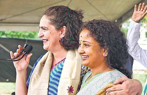 Congress leader Priyanka Gandhi Vadra with JMM’s Kalpana Soren during a public meeting in favour of INDIA bloc in Godda, Jharkhand, on Wednesday.