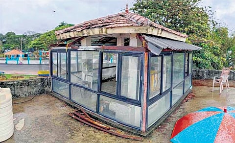 The partially broken lifeguard tower on Kollam beach