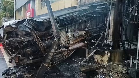 The ambulance that caught on fire following an accident in Kerala.