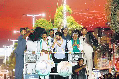 Chief Minister A Revanth Reddy takes part in a roadshow as part of election campaign in Armoor of Nizamabad Lok Sabha segment on Wednesday