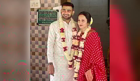 Newly married groom Akshay Dholaria with his wife Khyati