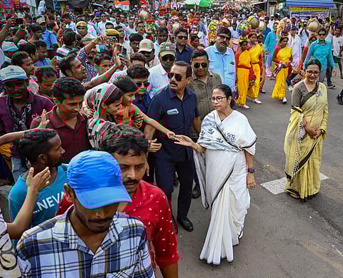 West Bengal Chief Minister and TMC Supremo Mamata Banerjee interacts with supporters during a rally for Lok Sabha elections, in Medinipur.