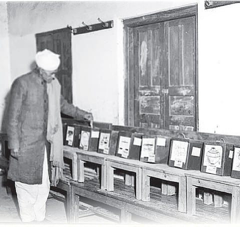 A citizen casts his vote in the 1951-52 elections