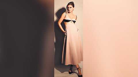 Curve-enhancing outfits from the collection.