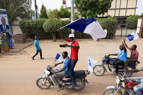 Supporters of Chad's transitional Prime Minister and Les Transformateurs party presidential candidate Succes Masra attend his final election campaign rally at the N'Djamena racecourse.