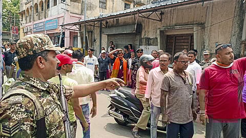 Security personnel deployed to maintain law and order following incidents of violence during the fourth phase of Lok Sabha elections, in Bardhman.