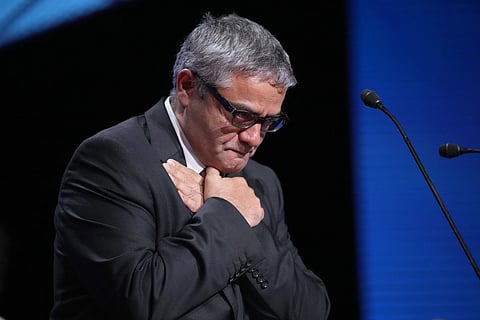 Mohammad Rasoulof accepts the special prize award for the film "The Seed of the Sacred Fig" during the awards ceremony of the 77th international film festival, Cannes, southern France, Saturday, May 25, 2024.