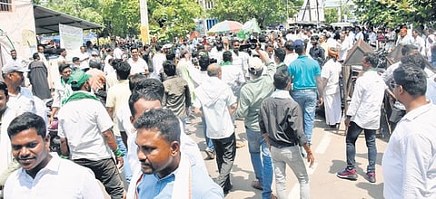 Party workers gather at the office of Cuttack collector during filing of nomination by their candidates on Thursday