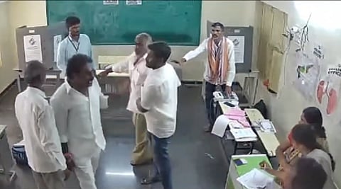 YSRC MLA Pinnelli Ramakrishna Reddy breakes EVM at the Palvaigate polling station 202 in Macharla constituency.