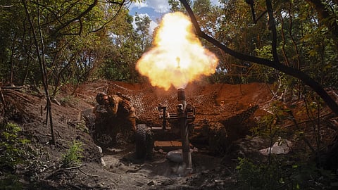 Servicemen of Ukraine's 93rd Mechanized Brigade fire a French MO-120-RT heavy mortar at the Russian forces on the front line near the city of Bakhmut in Ukraine's Donetsk region on Wednesday, May 22, 2024.