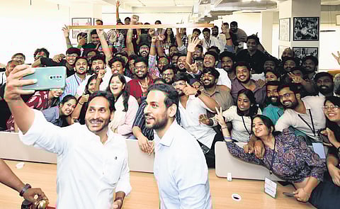 YSRC president and Chief Minister YS Jagan Mohan Reddy takes a selfie with the team of Indian Political Action Committee (I-PAC) on Thursday