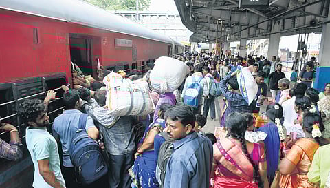 The crowded railway and bus stations with passengers going to their hometowns in Vijayawada