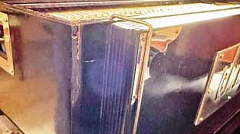 The damaged harmonium that reached
Oman in Air India Express