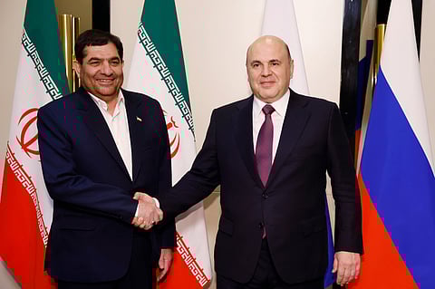 Russian Prime Minister Mikhail Mishustin, right, and Iranian First Vice-President Mohammad Mokhber.
