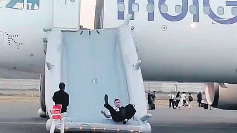 A pilot exits from the flight that received bomb threat at IGIA on Tuesday.