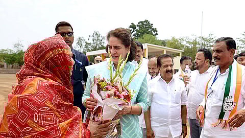Congress General Secretary Priyanka Gandhi Vadra receives a warm welcome as she arrives for the Nyay Sankalp Sabha, in Nandurbar on Saturday.