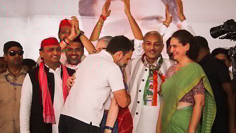 Congress leader and party candidate from Rae Bareli constituency Rahul Gandhi hugs his mother and party leader Sonia Gandhi during a public meeting for the Lok Sabha elections.
