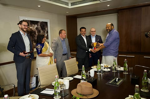 Industries minister P Rajeeve welcoming the top brass of dSPACE officials during the opening of the Thiruvananthapuram centre.