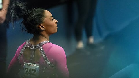 Simone Biles watches the scoreboard during the US Classic gymnastics event Saturday, May 18, 2024, in Hartford, Conn.