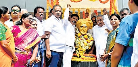 TDP activists celebrate the 101st birth anniversary of party founder NT Rama Rao at the office of Vijayawada Lok Sabha candidate on Tuesday