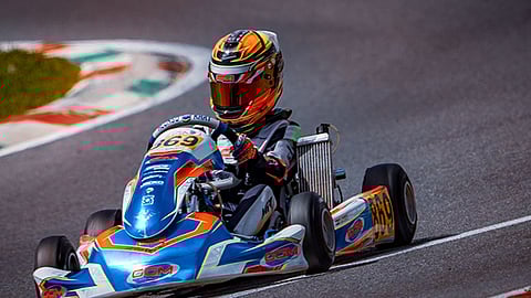 The 11-year-old is placed seventh overall in the International OK-NJ class (age 12–14).