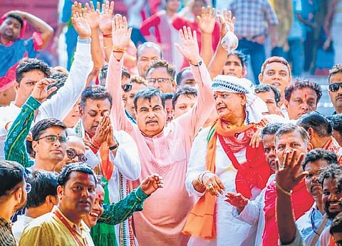 Union Minister Nitin Gadkari raising his hands in reverence to Lord Jagannath at Srimandir in Puri on Thursday