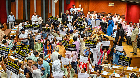BJP councillors stage a protest against Delhi Chief Minister and AAP Supremo Arvind Kejriwal, inside the MCD House, in New Delhi, Tuesday, May 14, 2024.