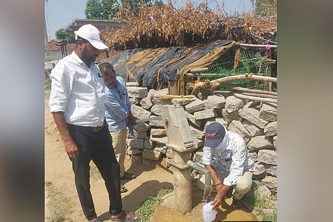 Groundwater department officials and staff test the quality of groundwater in Kamareddy district on Thursday