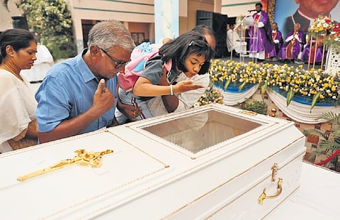 People pay their last respects to the mortal remains of former Archbishop Thumma Bala at St. Mary’s School in Secunderabad on Friday