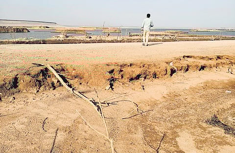 The remnants of villages that were submerged for the Kondapochamma project are now visible again due to the depleting water levels in the reservoir