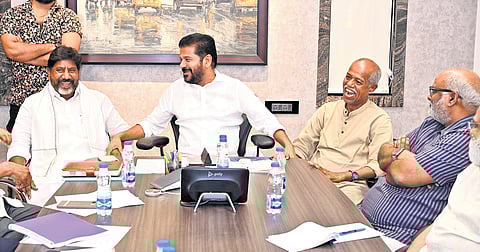 Chief Minister A Revanth Reddy shares a lighter moment with Deputy Chief Minister Mallu Bhatti Vikramarka, poet Ande Sri and music director MM Keeravaani during a meeting on Wednesday