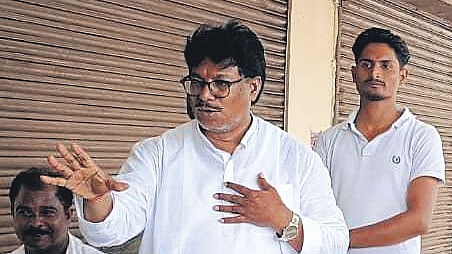 Sudam Marndi Interacting with voters as part of his poll campaign in Baripada town.
