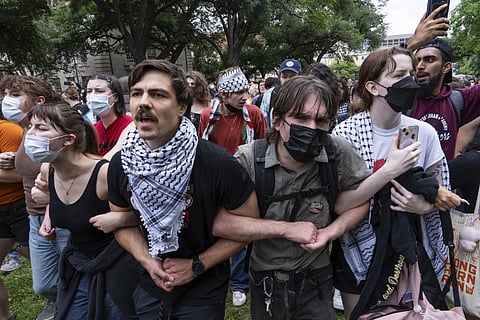 Demonstrators chant at a pro-Palestinian protest at the University of Texas, on April 24, 2024, in Austin, Texas.