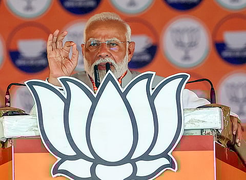 Prime Minister Narendra Modi addresses during a public meeting for the Lok Sabha polls, in Mirzapur on Sunday.