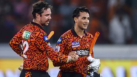 Sunrisers Hyderabad's Travis Head and Abhishek Sharma celebrate after winning the IPL 2024 T20 cricket match between Sunrisers Hyderabad and Lucknow Super Giants on May 8, 2024.